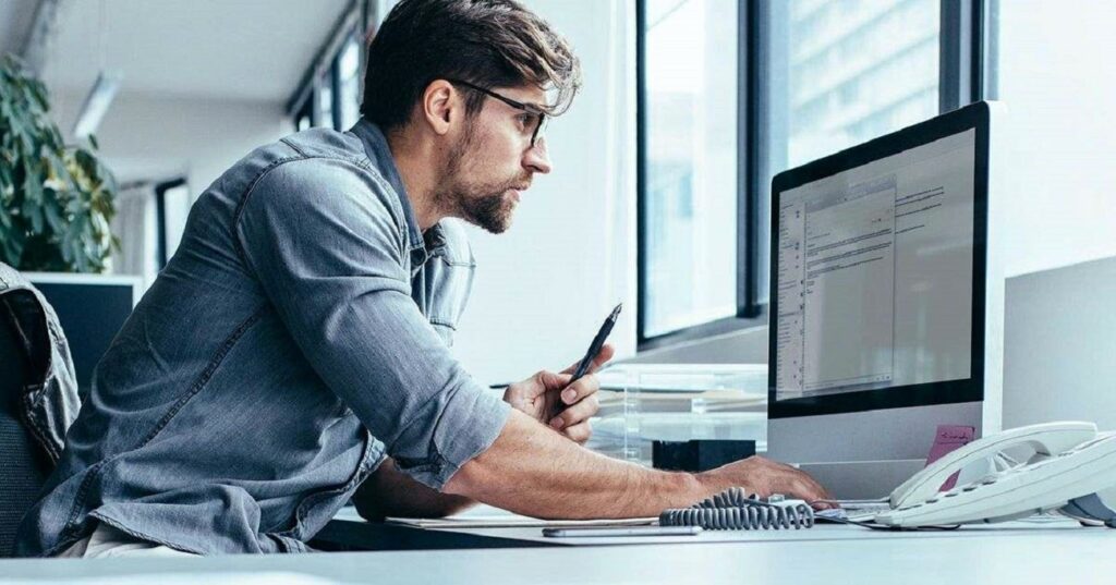 A businessman working on prospect scoring